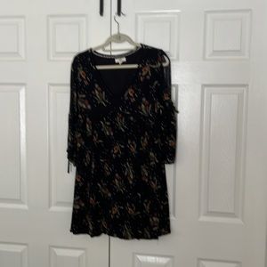 Black flirty bohemian top or shirt dress. Large, slit sleeves. Great with boots